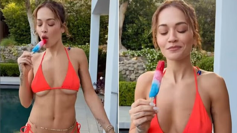 Rita Ora shfaqet provokuese në bikini të portokallta në pozat e reja, ndërsa promovon këngën e saj të re “Heat”